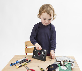 Image showing computer parts on wooden desk