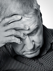 Image showing Senior man with a headache