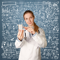 Image showing Doctor woman with cup for analysis