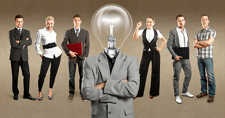 Image showing Business Team With Lamp Head