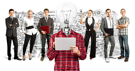 Image showing Business Team With Lamp Head