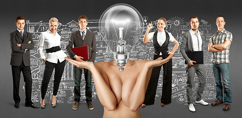 Image showing Business Team With Lamp Head