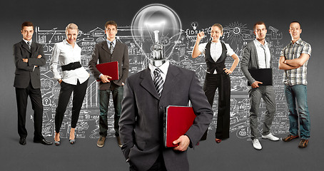 Image showing Business Team With Lamp Head