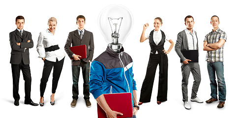 Image showing Business Team With Lamp Head