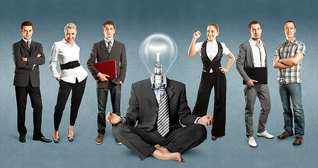 Image showing Business Team With Lamp Head