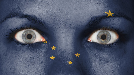 Image showing Close up of eyes with flag