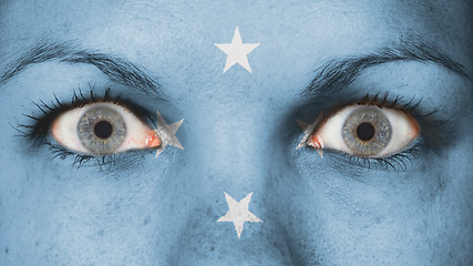 Image showing Close up of eyes with flag