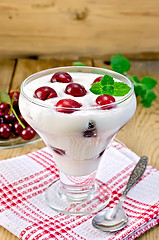Image showing Yogurt thick with cherry on the board