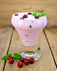 Image showing Yogurt thick with cranberries on the board