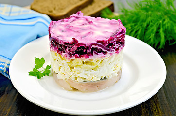 Image showing Herring with vegetables in white plate