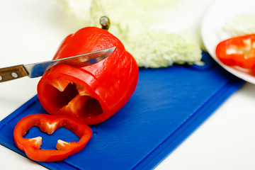 Image showing Red pepper and a knife