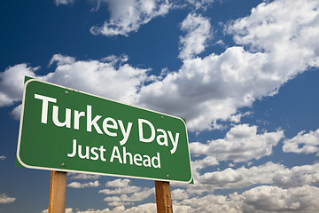 Image showing Turkey Day Green Road Sign and Clouds