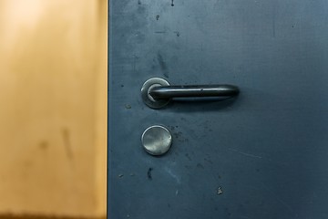 Image showing Aluminum door knob on steel entrance