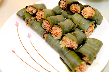 Image showing Sticky rice steamed in bamboo leaves