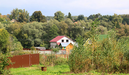 Image showing The house in the village in the trees