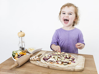 Image showing happy child making pizza