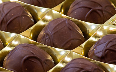 Image showing Chocolate candies in shiny package.