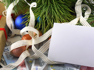 Image showing Christmas balls and fir branches with decorations and blank card