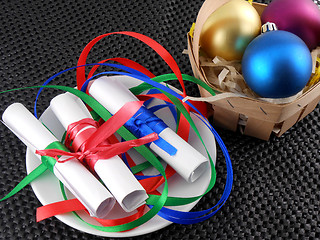 Image showing white invitation paper with gift and christmas balls