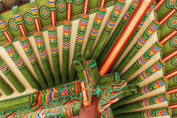 Image showing Traditional korean paintwork on wooden buildings