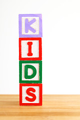 Image showing Alphabet building blocks that spelling the word kids