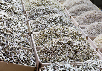 Image showing Dried assorted anchovy fish in the market