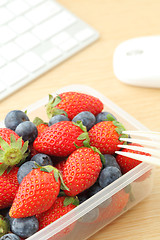 Image showing Healthy lunch on the working desk