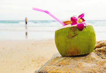 Image showing Coconut drink on the beach
