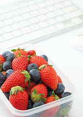 Image showing Healthy lunch box on office desk