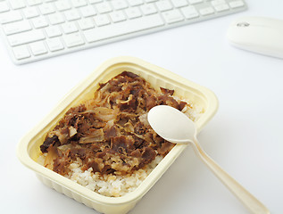 Image showing Unhealthy lunch box at office