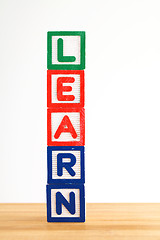 Image showing Alphabet building blocks that spelling the word learn