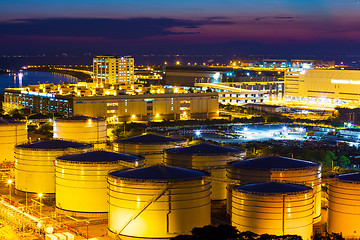 Image showing Oil tanks plant during sunset