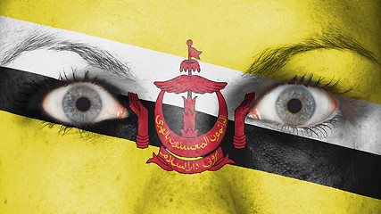 Image showing Close up of eyes with flag