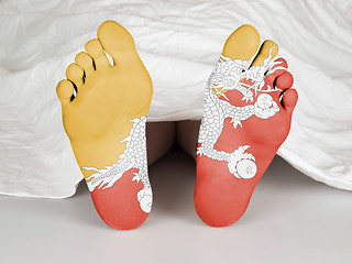 Image showing Feet with flag