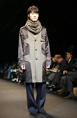 Image showing Asian male model on the catwalk during a fashion show - EDITORIA