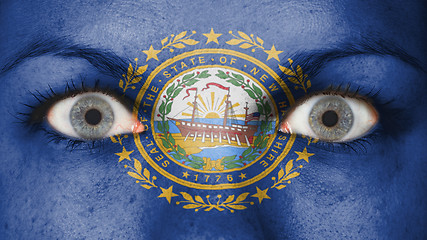 Image showing Close up of eyes with flag