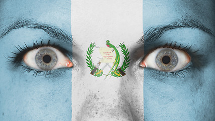 Image showing Close up of eyes with flag