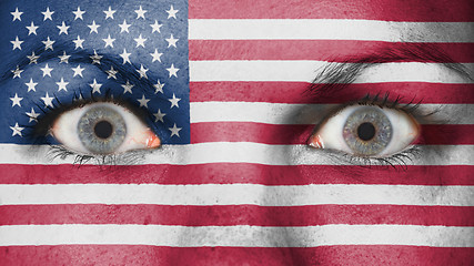 Image showing Close up of eyes with flag