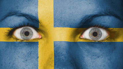 Image showing Close up of eyes with flag