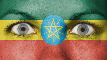 Image showing Close up of eyes with flag