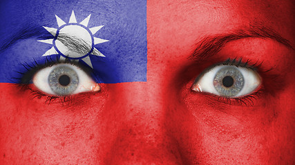 Image showing Close up of eyes with flag