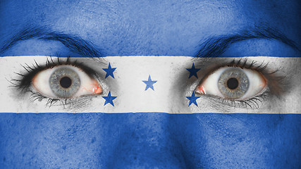 Image showing Close up of eyes with flag