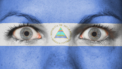 Image showing Close up of eyes with flag