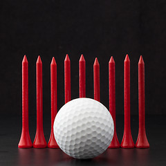 Image showing Golf balls on the black background