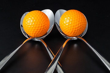 Image showing Sponns and golf balls