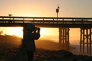 Image showing Photographer At Sunset