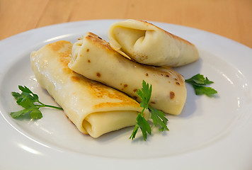 Image showing Spring rolles on the white plate