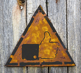 Image showing Thumb Up Icon on Rusty Warning Sign.