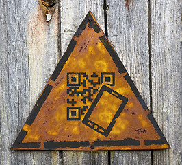 Image showing QR Code Icon on Weathered Warning Sign.