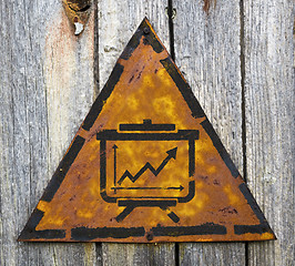 Image showing Flipchart Icon on Rusty Warning Sign.